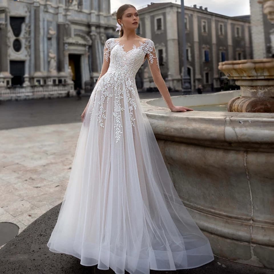 Lace Sheer Tulle A line Wedding Gown With A Short Train, Exuding Elegance For The Bride