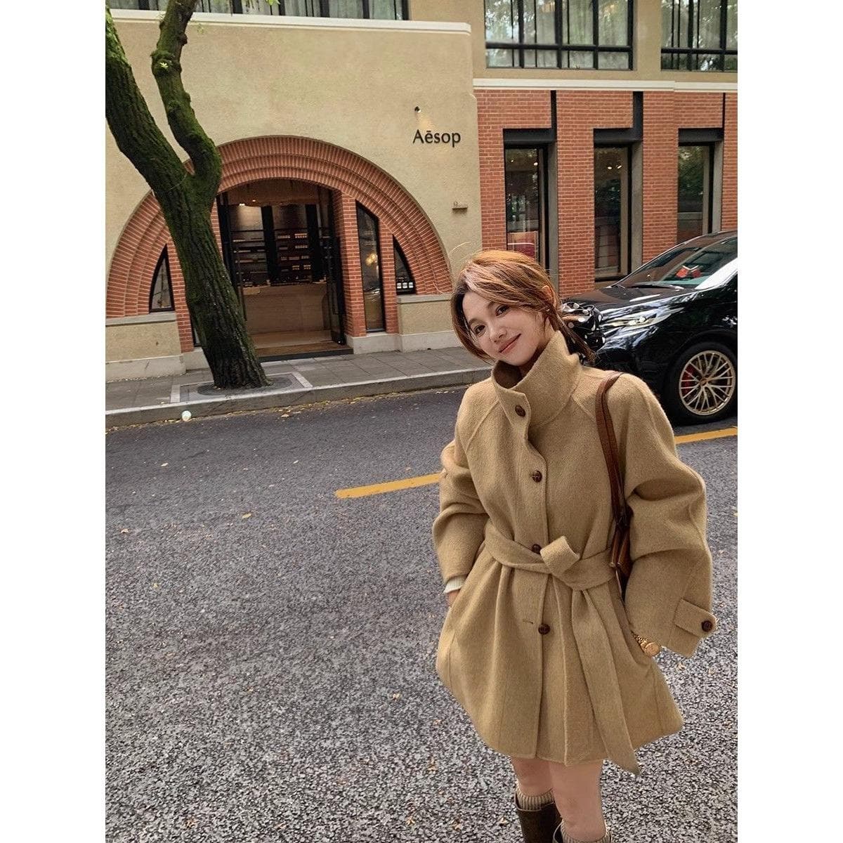 Women's Wool Coat With A Stand-up Collar And Tie Belt